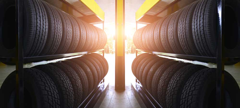 Bundles of tire are kept on the shelf in the warehouse.
