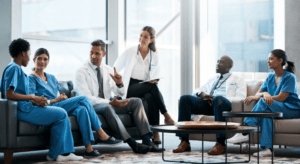 doctors & nurses are sitting in a hall and discussing healthcare insurance programs