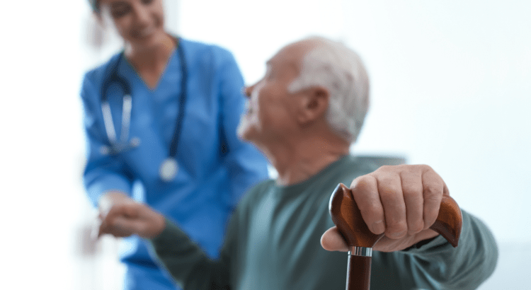 Nurse is helping an old man