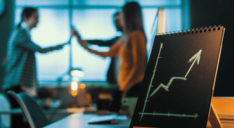 Employees are shaking hands in the office