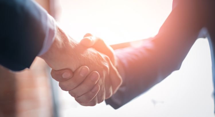 Two people shaking hands